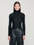 Layered turtleneck jumper