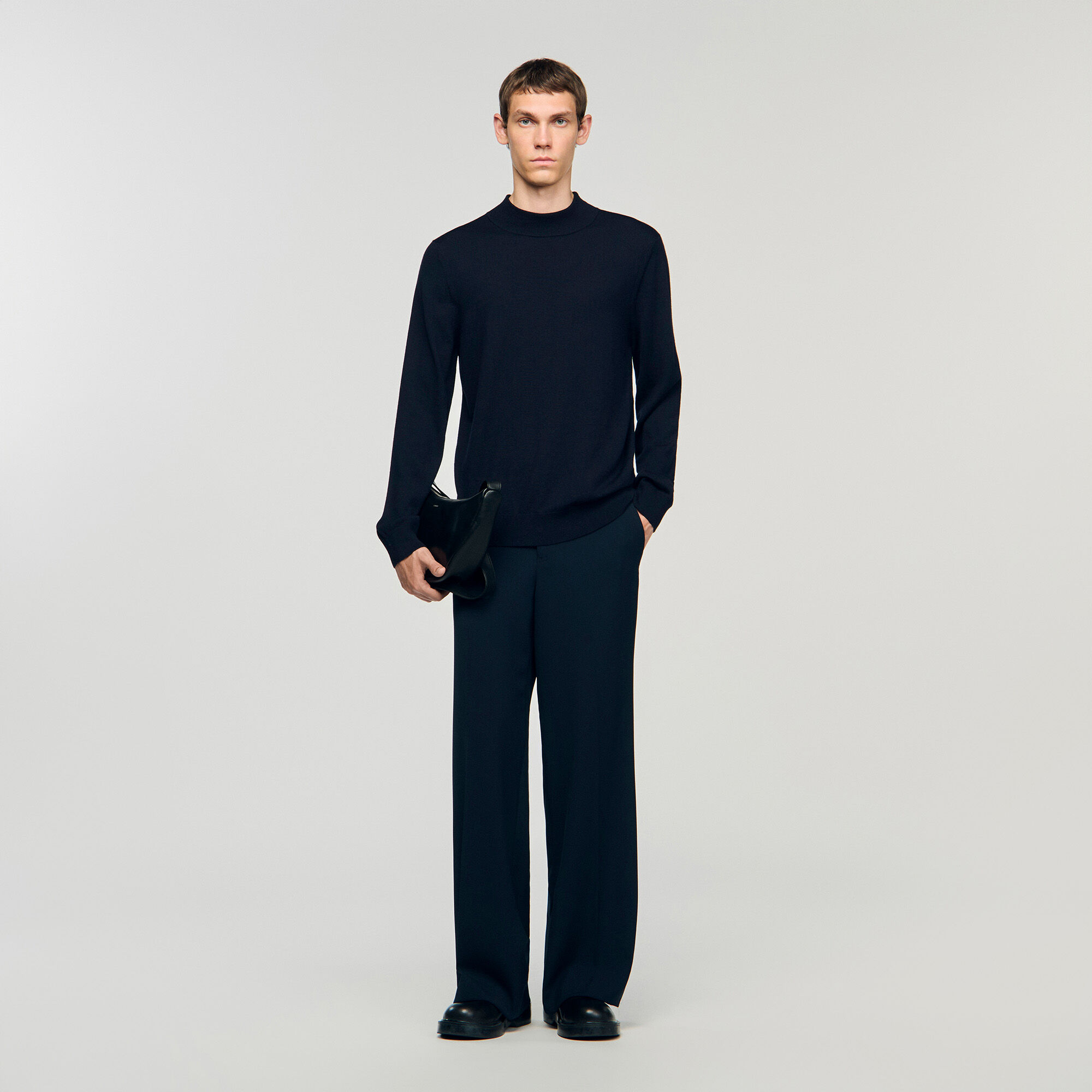 Wool jumper with a high collar