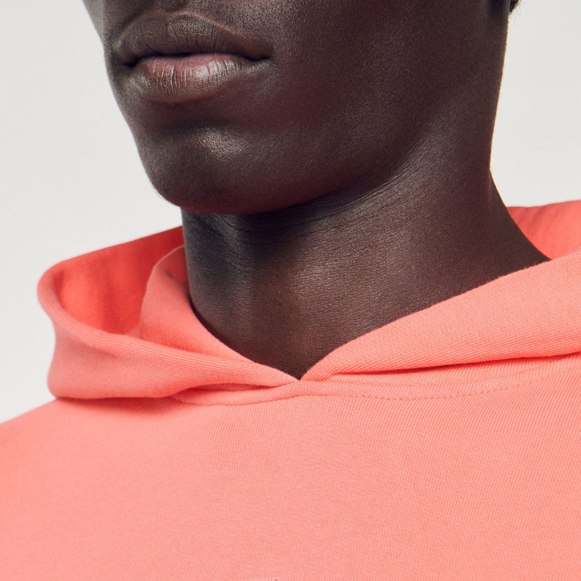 Hooded sweatshirt with rubber logo