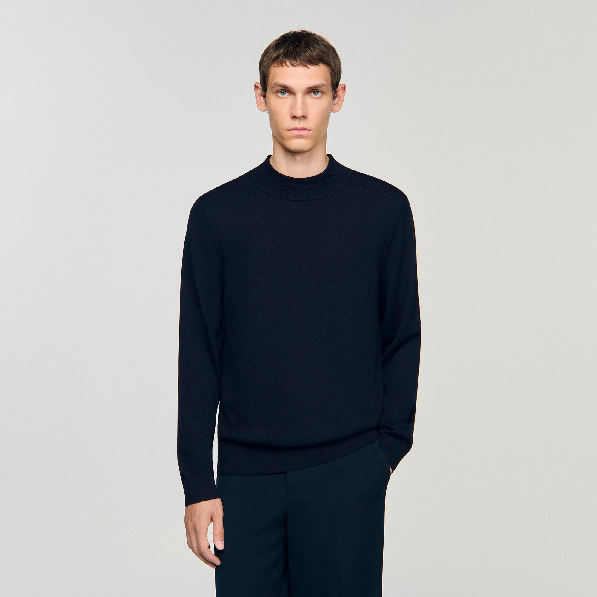 Wool jumper with a high collar