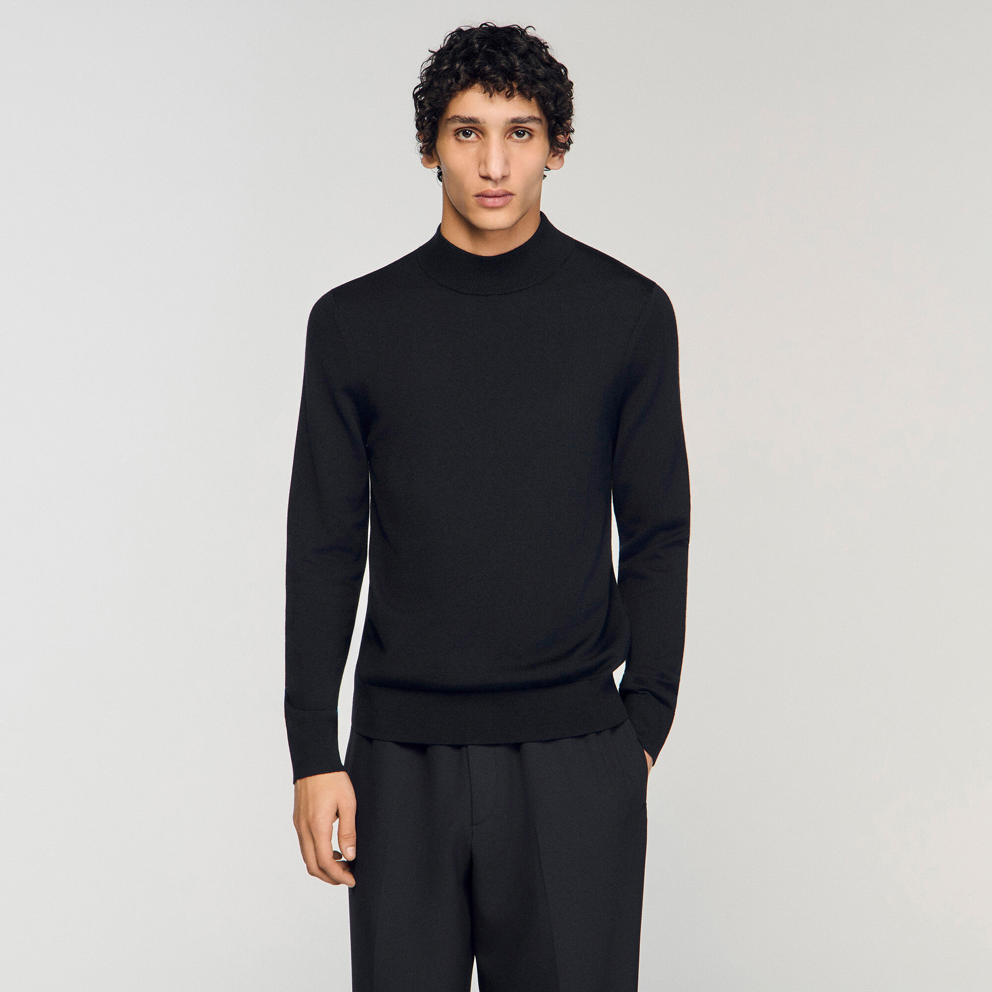 Wool jumper with a high collar