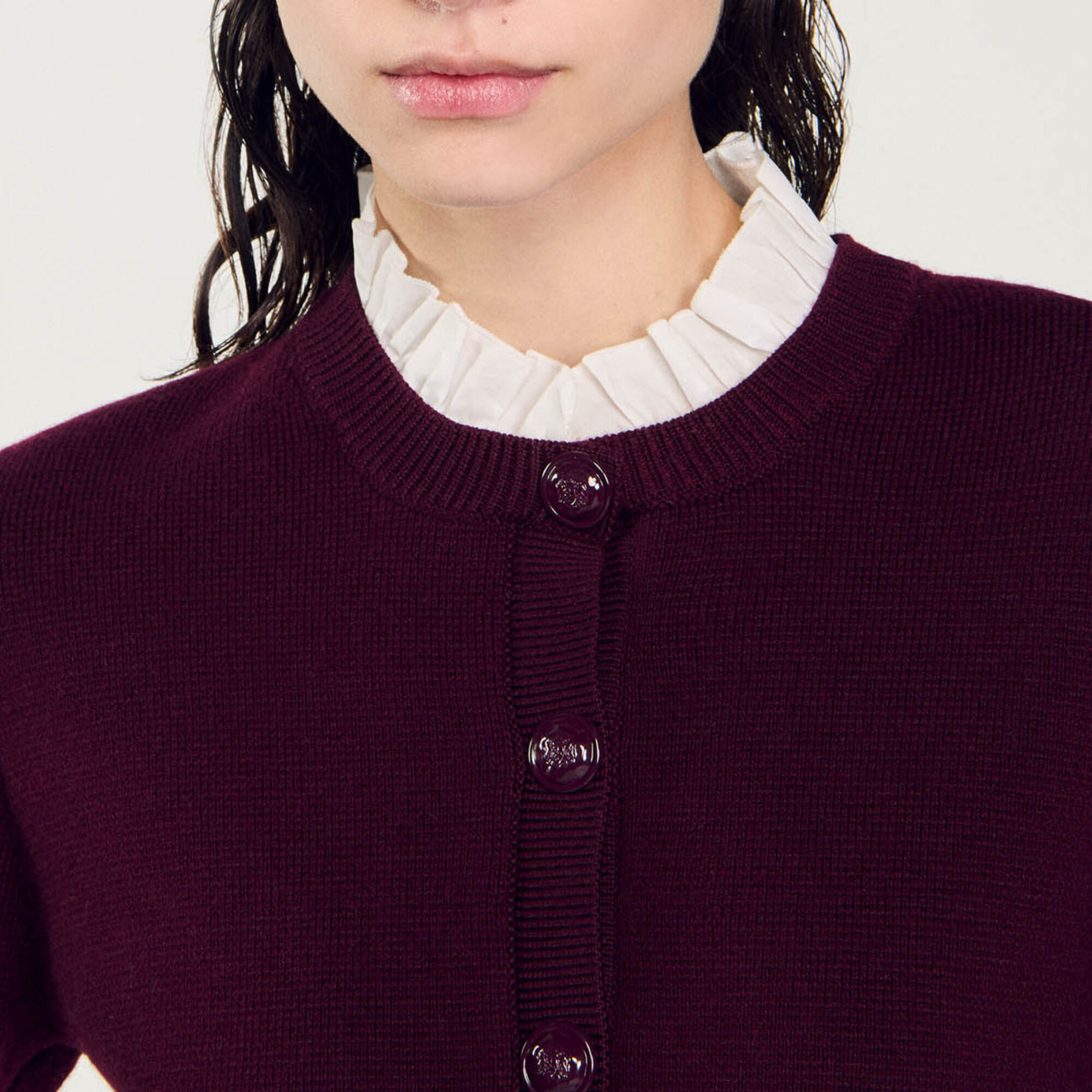 Knit cardigan with ruffled collar