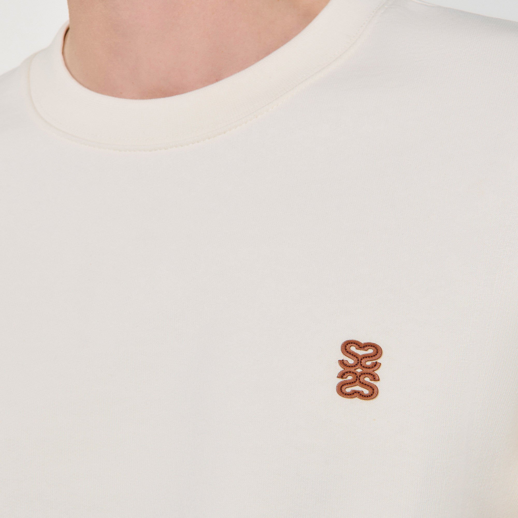 Oversized sweatshirt with leather patch