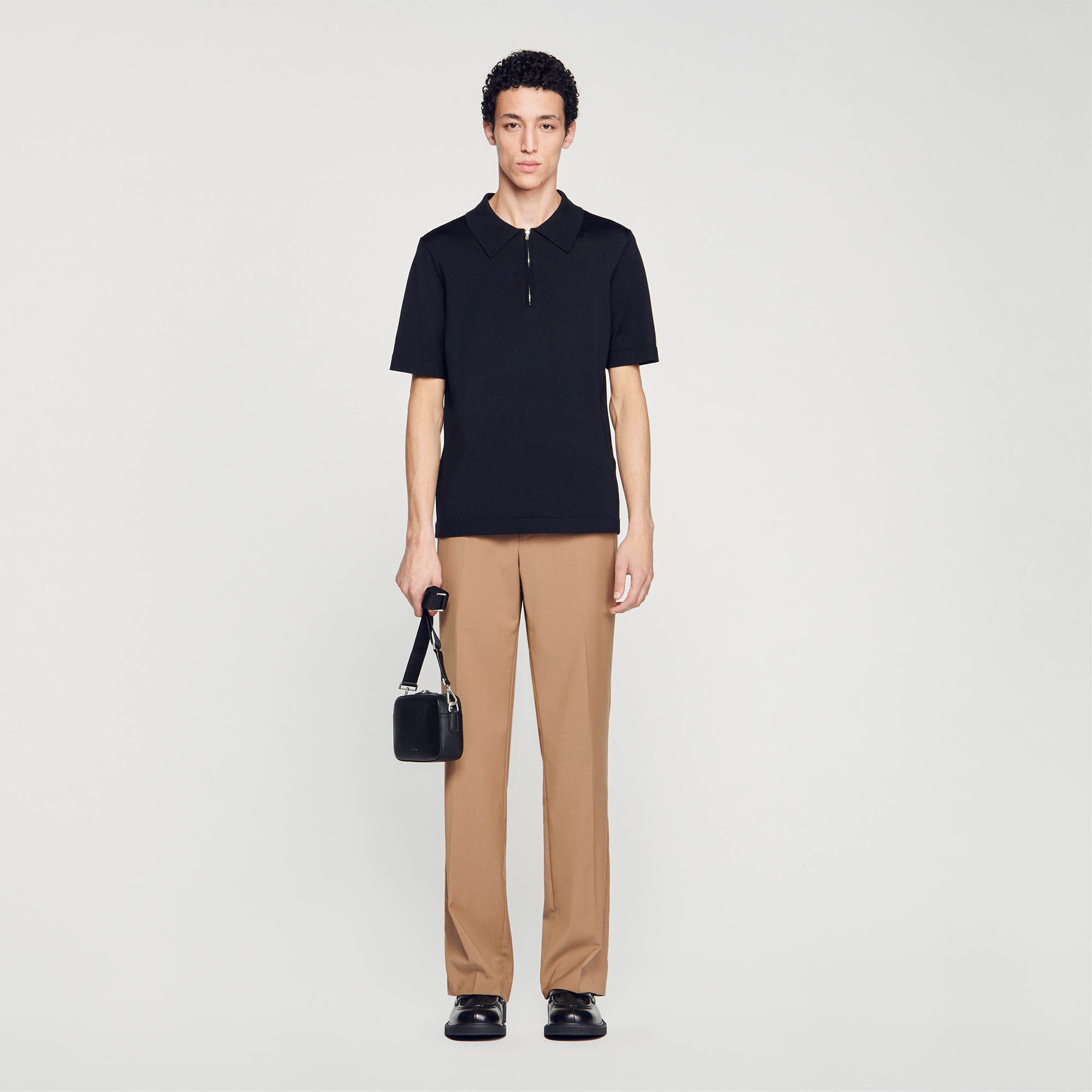 Knitted polo shirt with zip collar Black / Gray | Sandro Paris