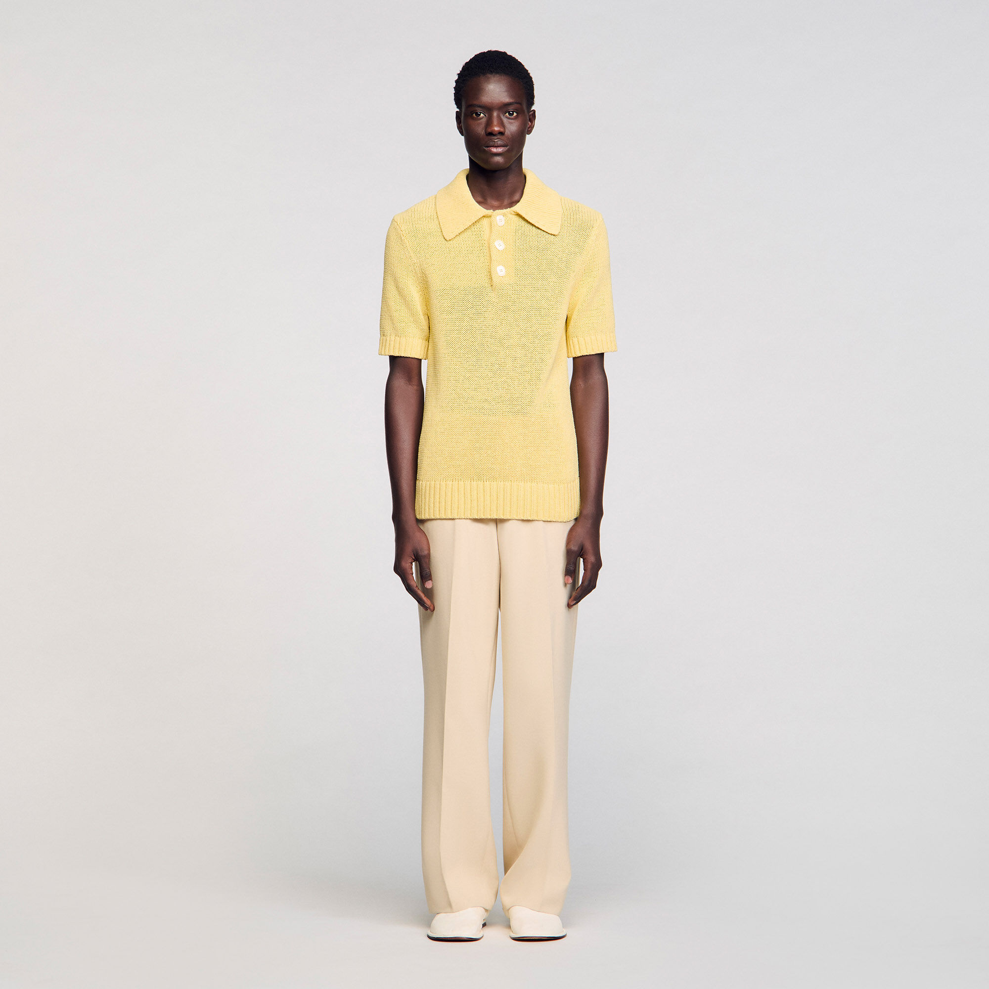 Knit polo shirt yellow / orange for Men | Sandro Paris