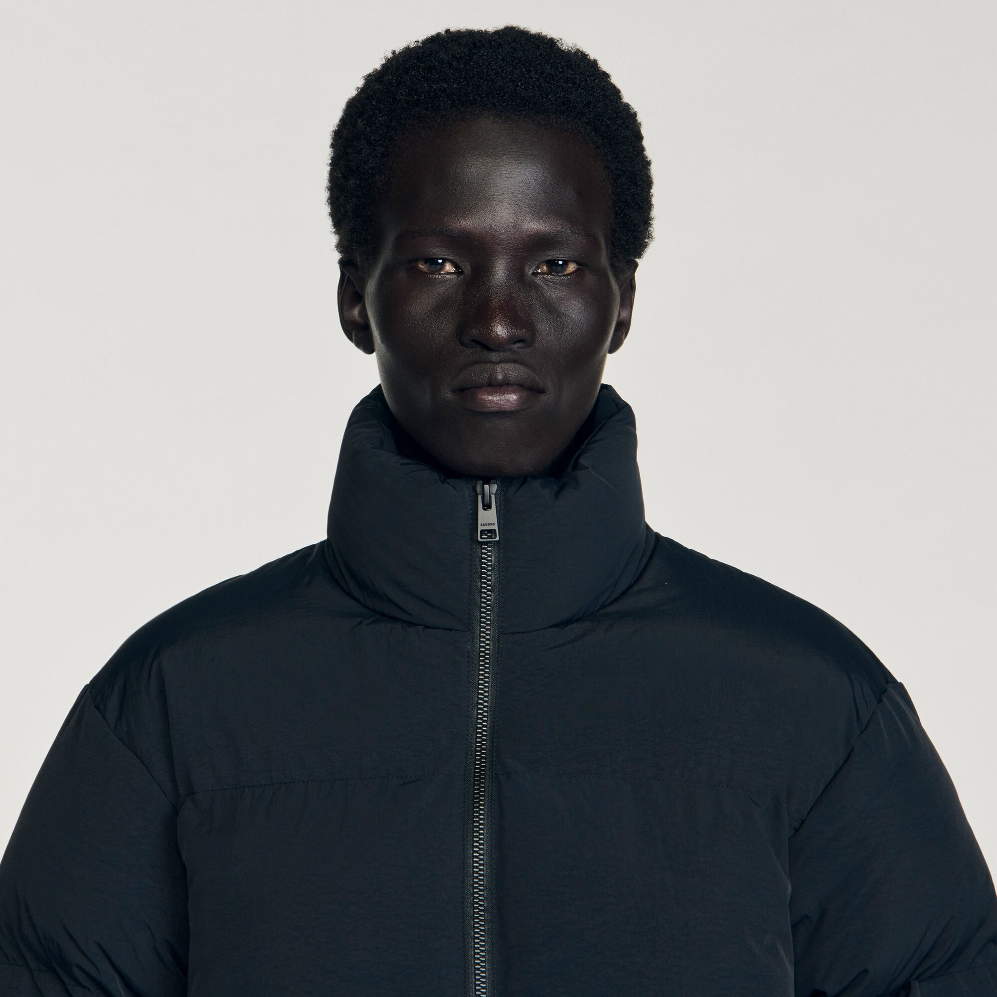 Hooded puffer with high collar