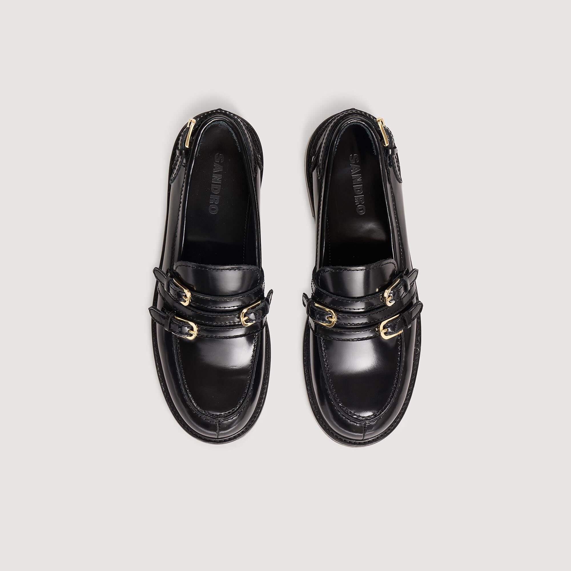Leather loafers with buckles