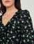 Short gathered dress with a floral print