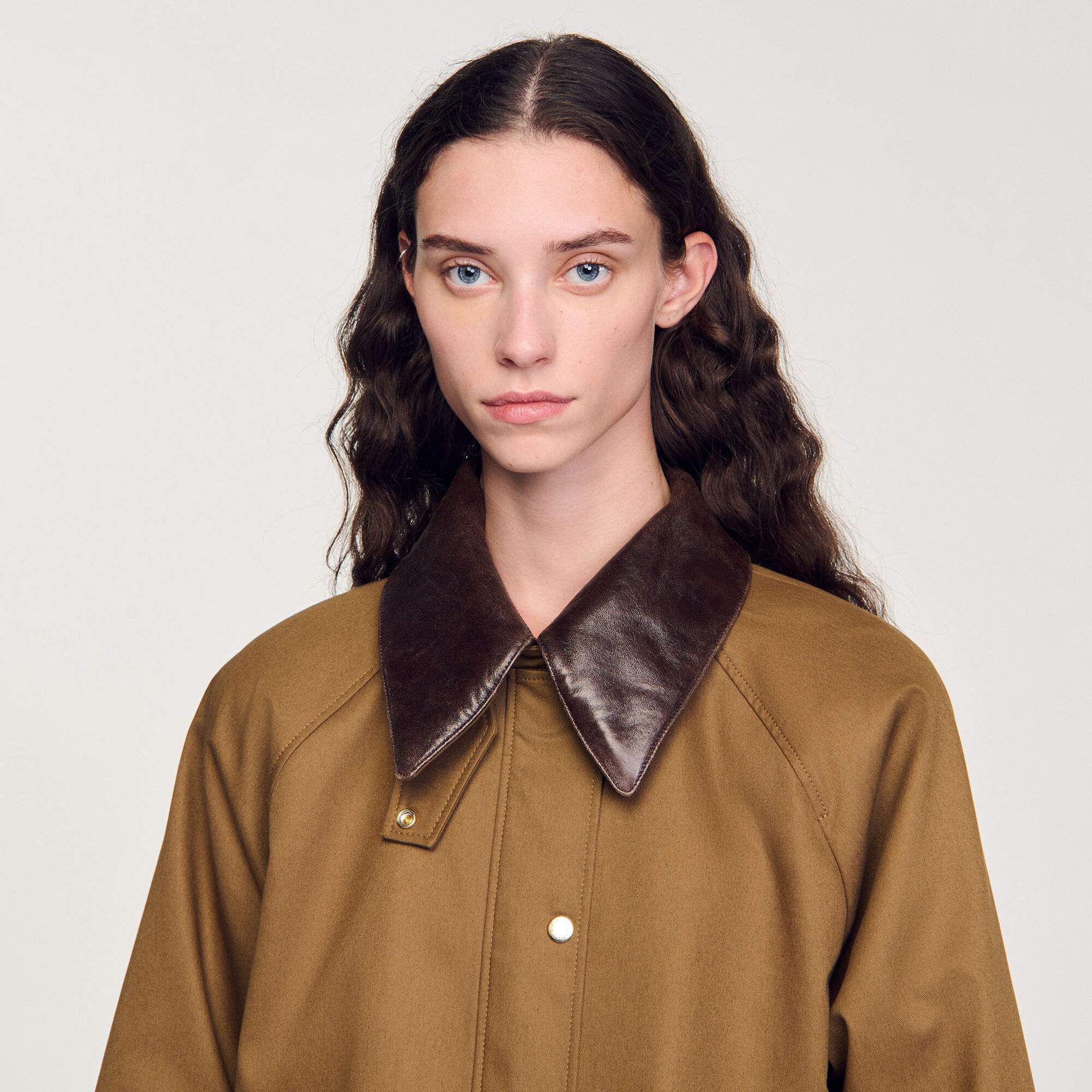 Coat with leather collar