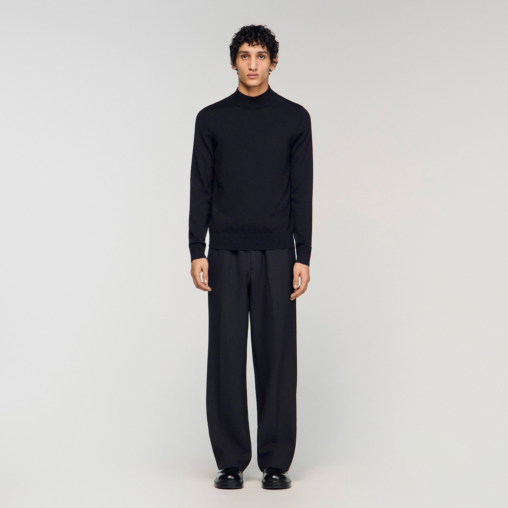 Wool jumper with a high collar