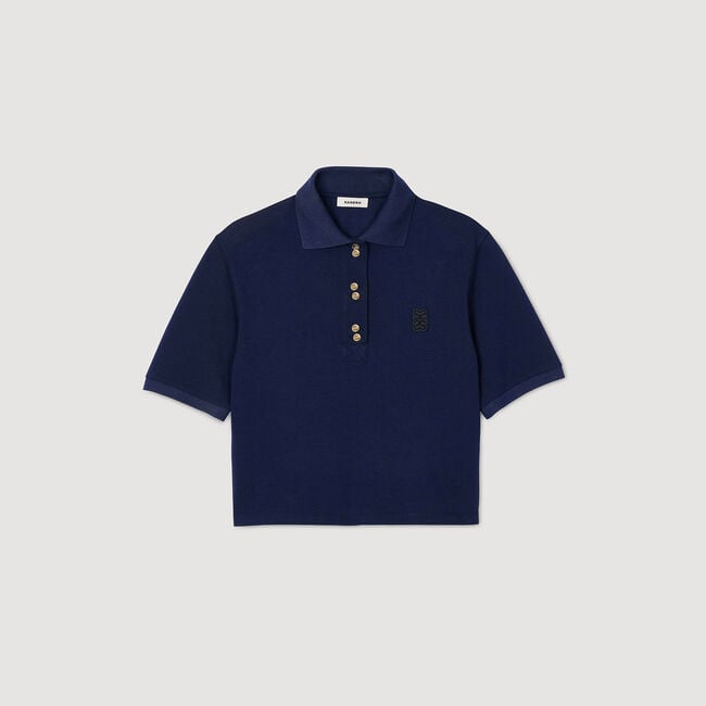 Polo shirt with decorative buttons