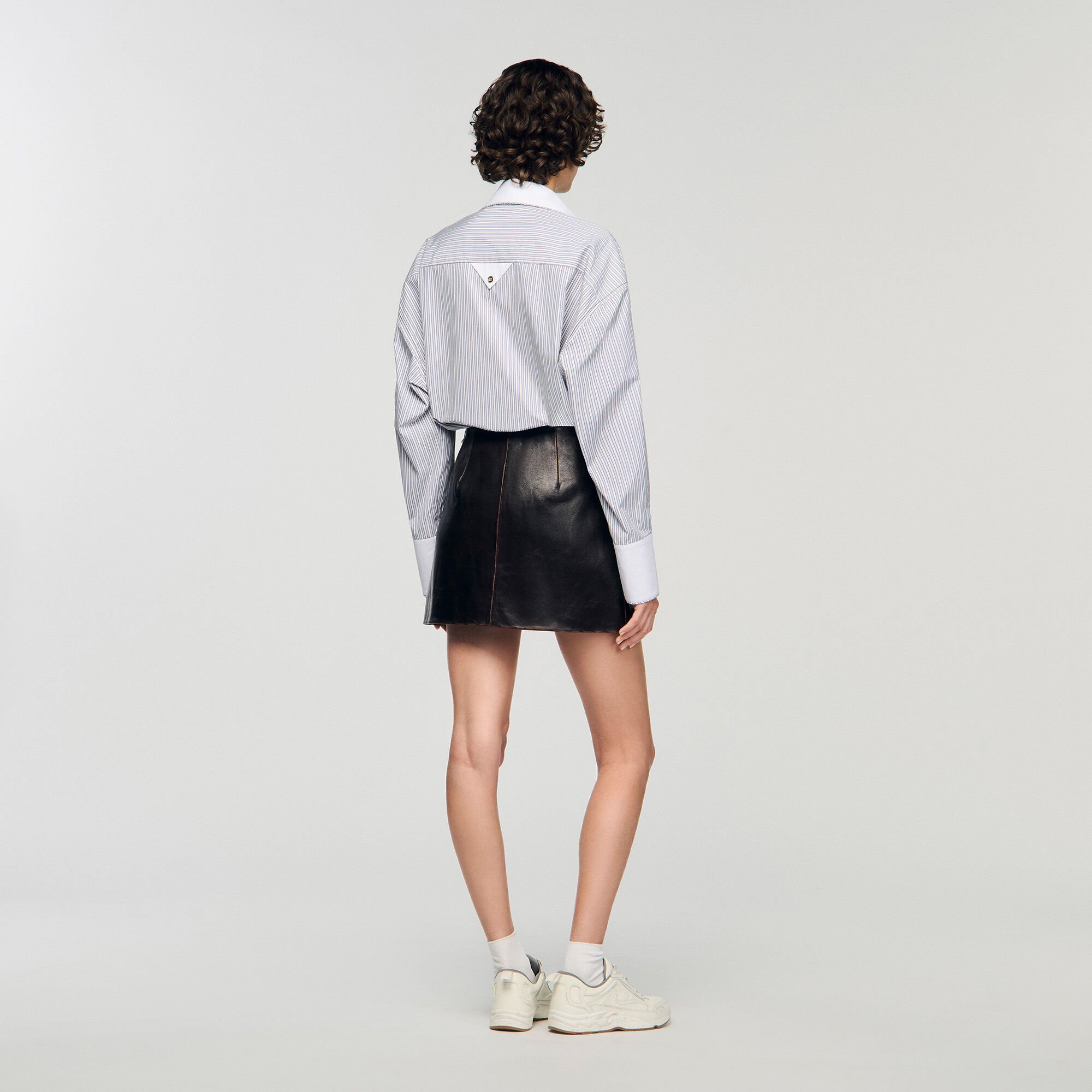 Short aged leather skirt