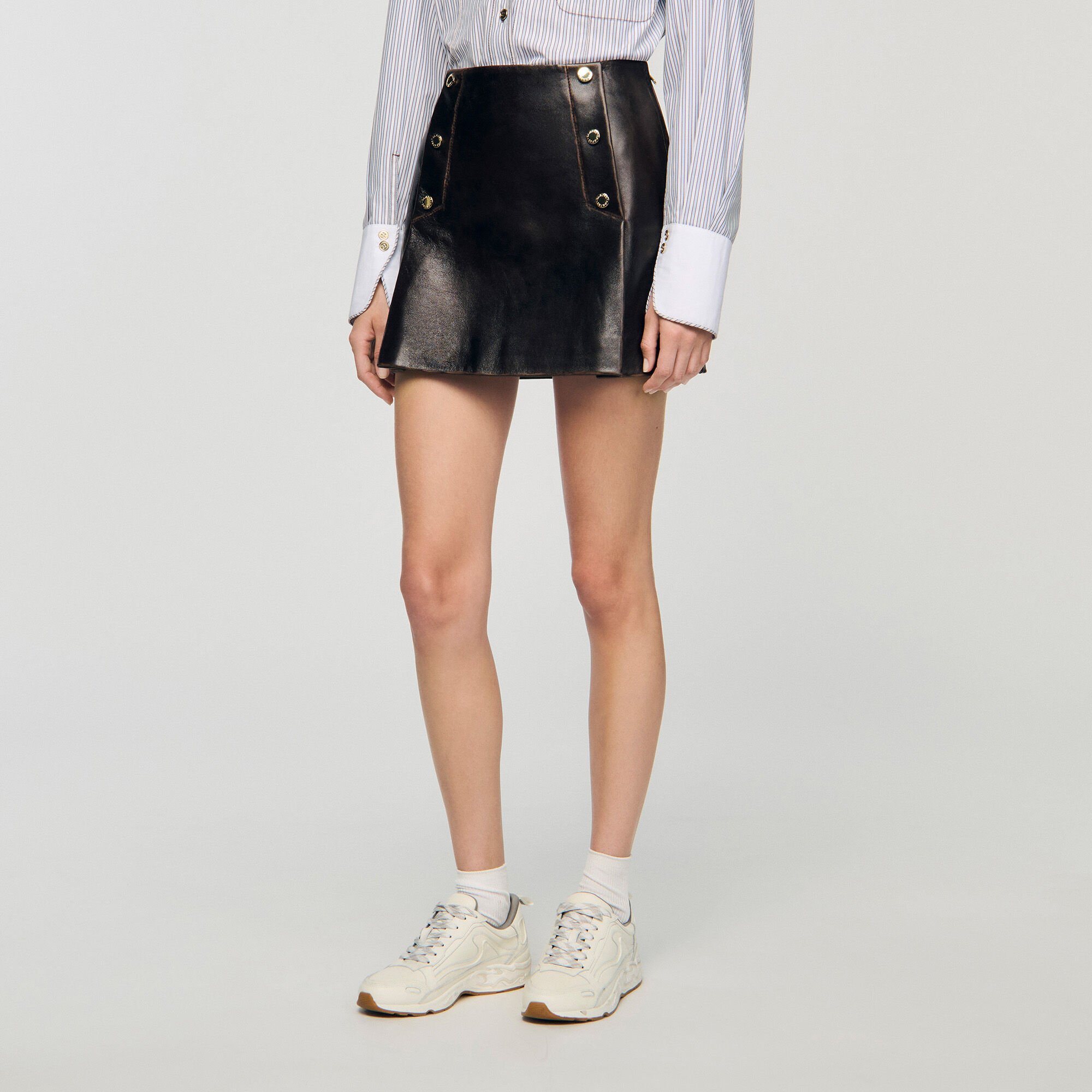Short aged leather skirt
