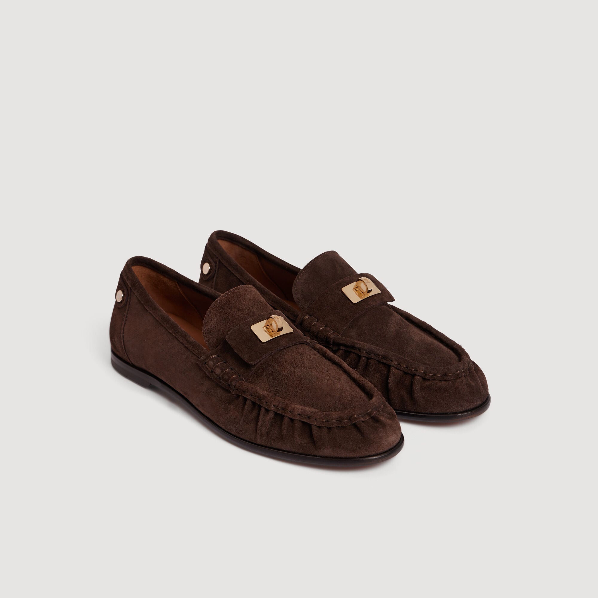 Suede loafers with clasp