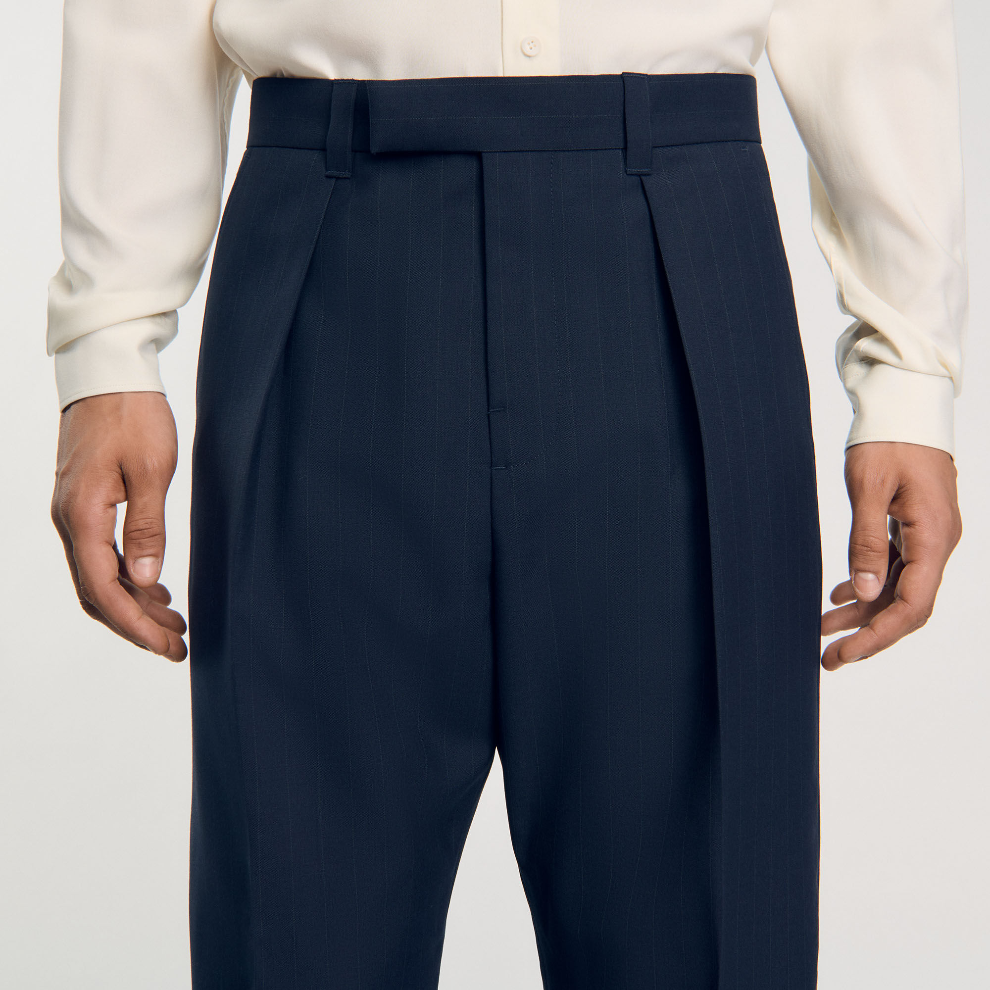 Box pleat trousers