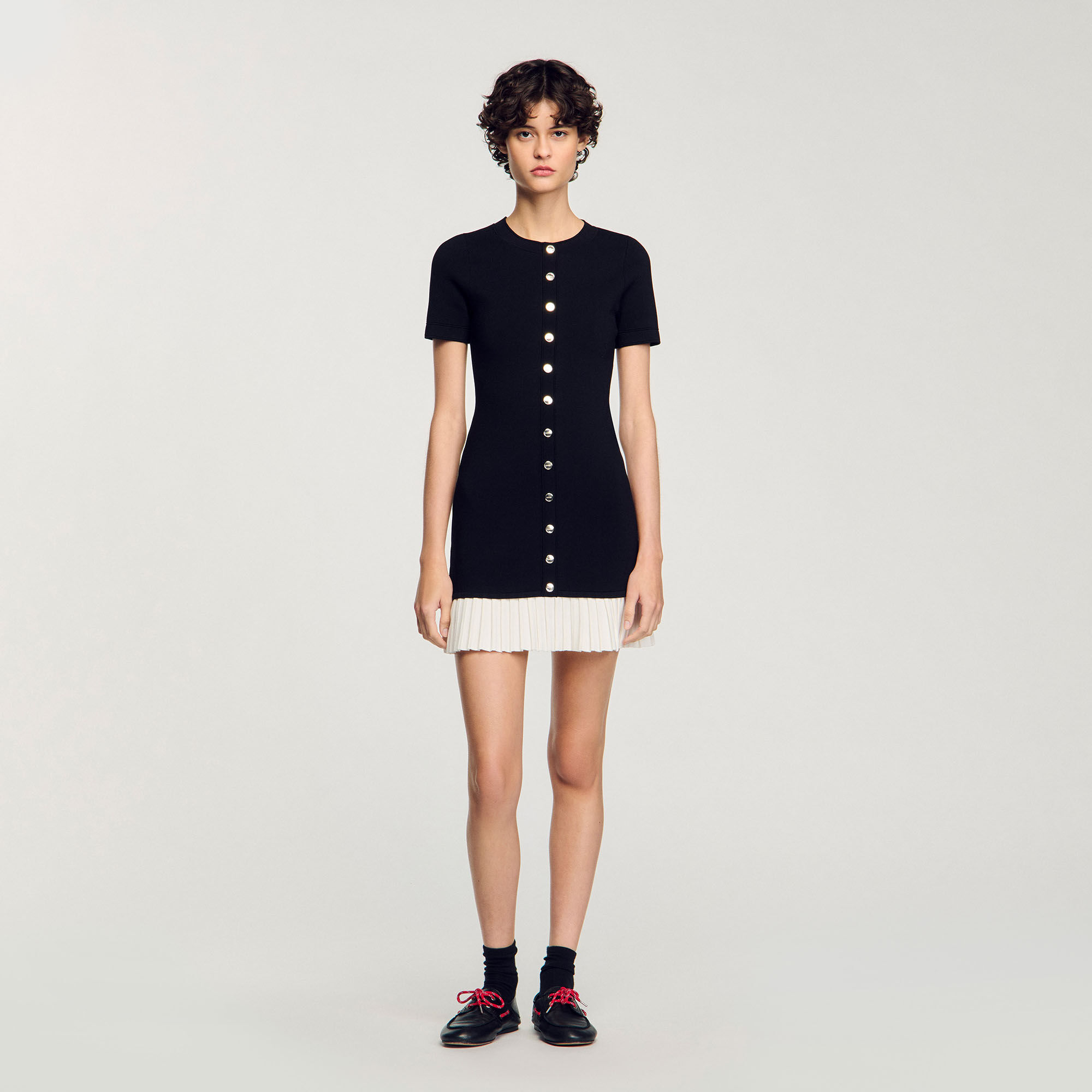 Short knit dress with ruffle