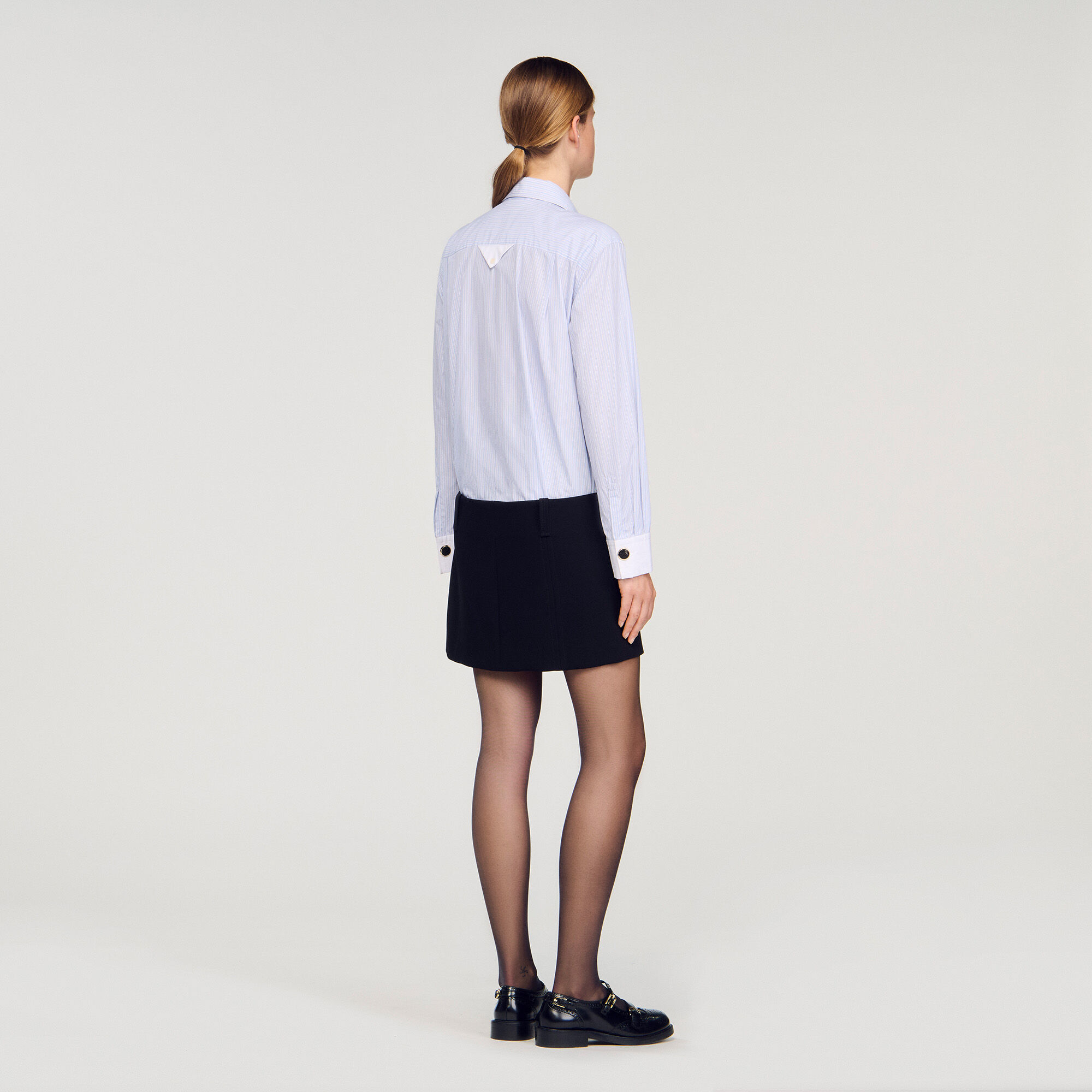 Short dress with dual materials