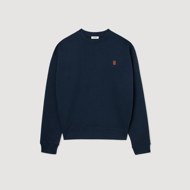Oversized sweatshirt with leather patch