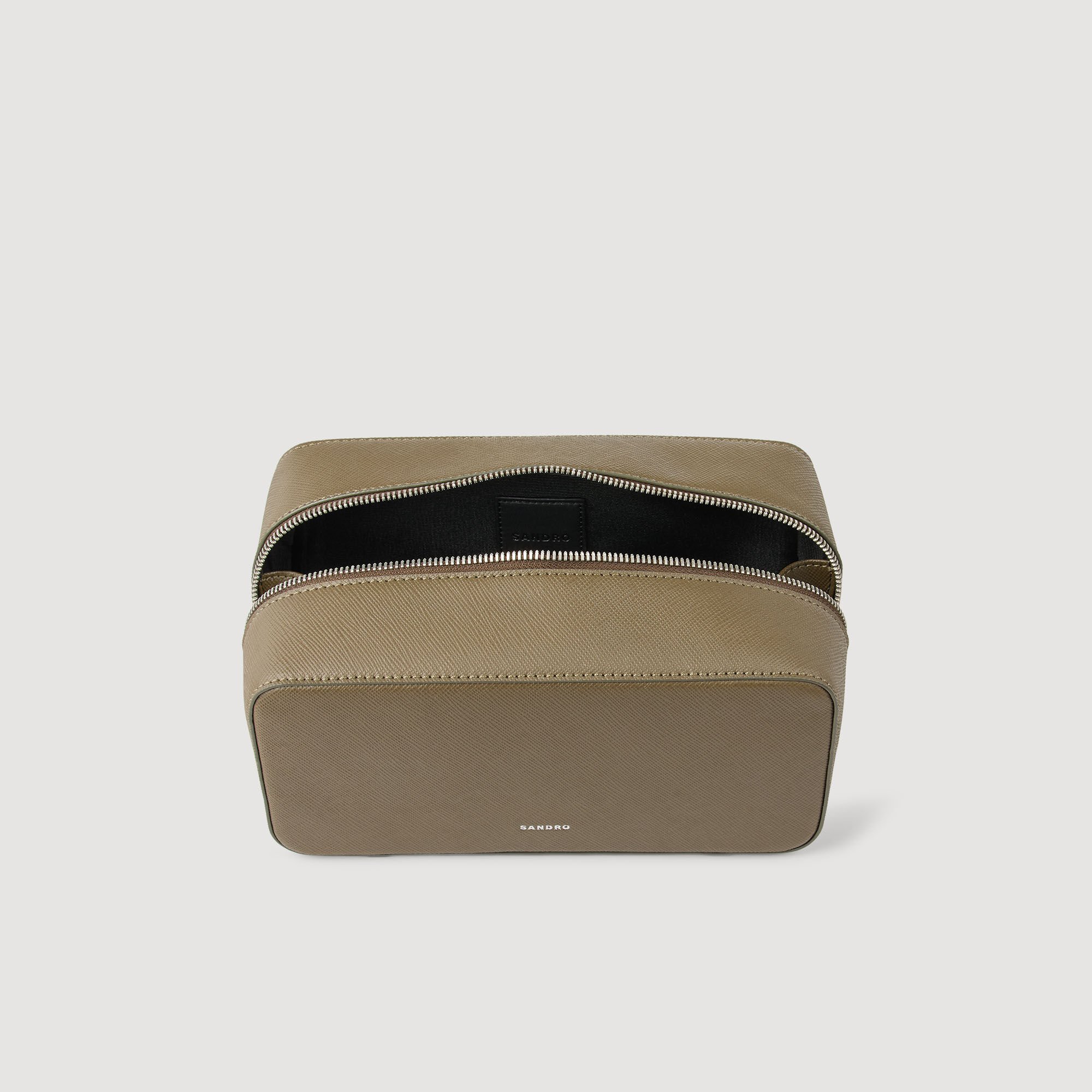 Toilet bag in reconstituted leather