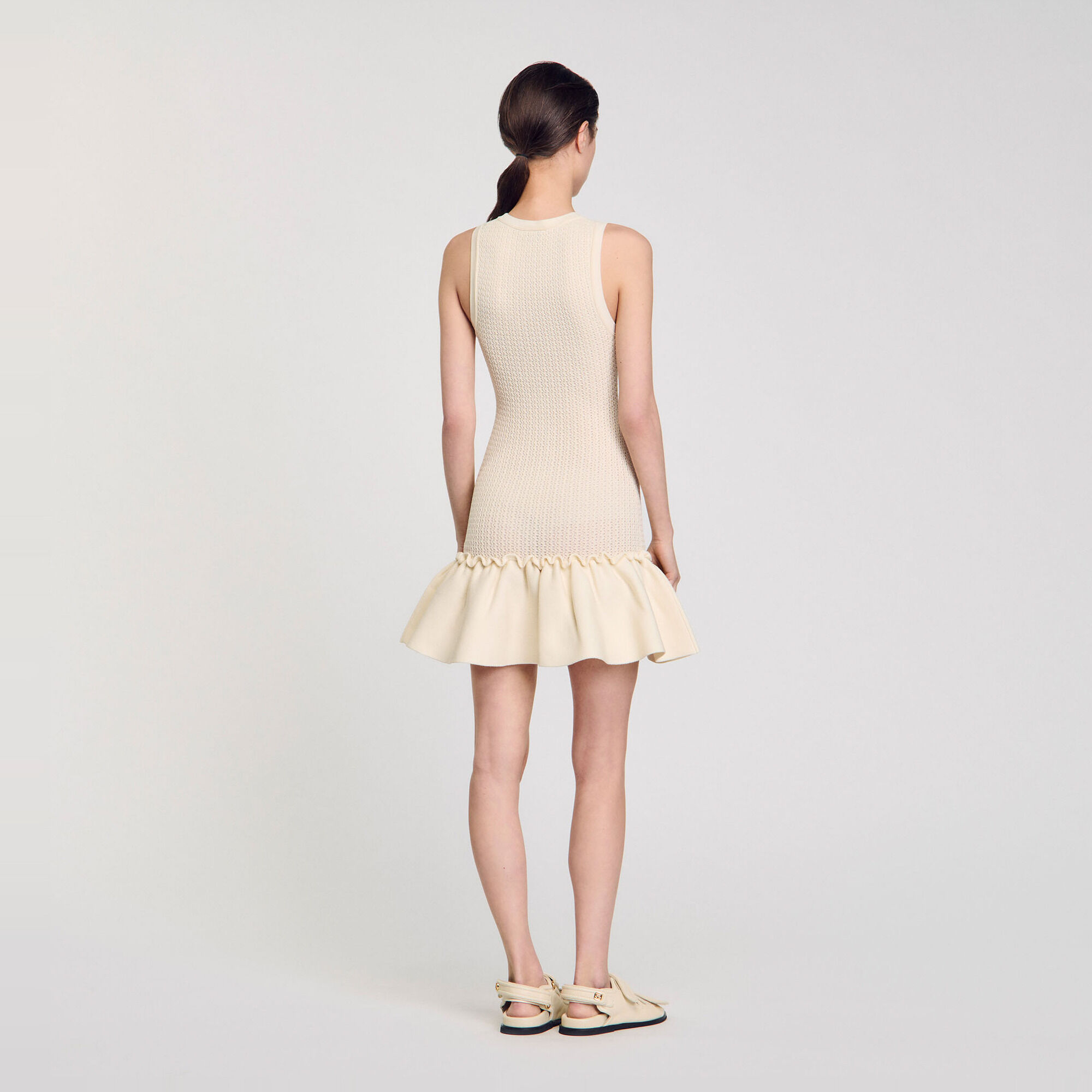 Short knit dress with ruffle - Women | Sandro