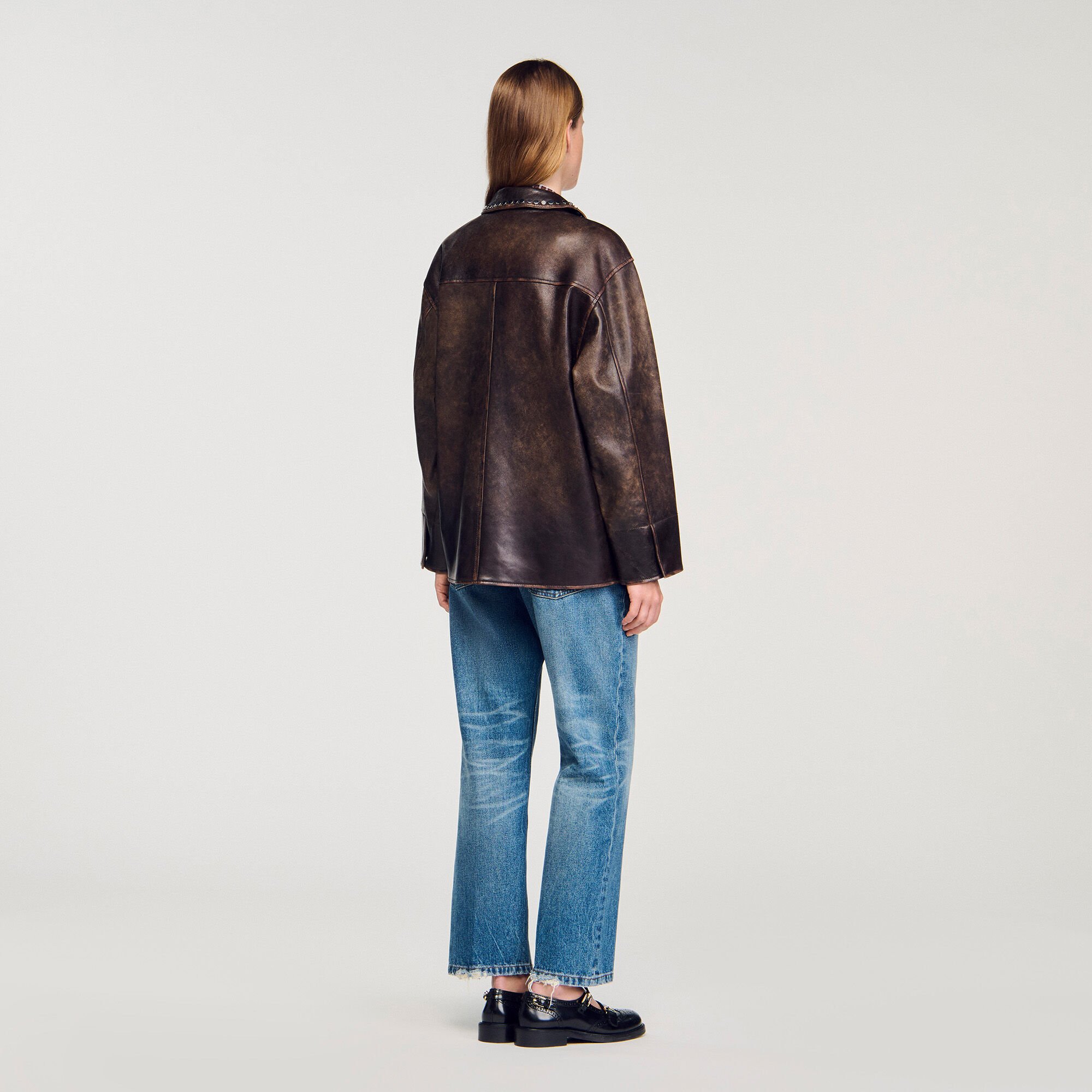Oversized leather jacket with studs