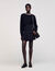 Short skirt with stitched pleats