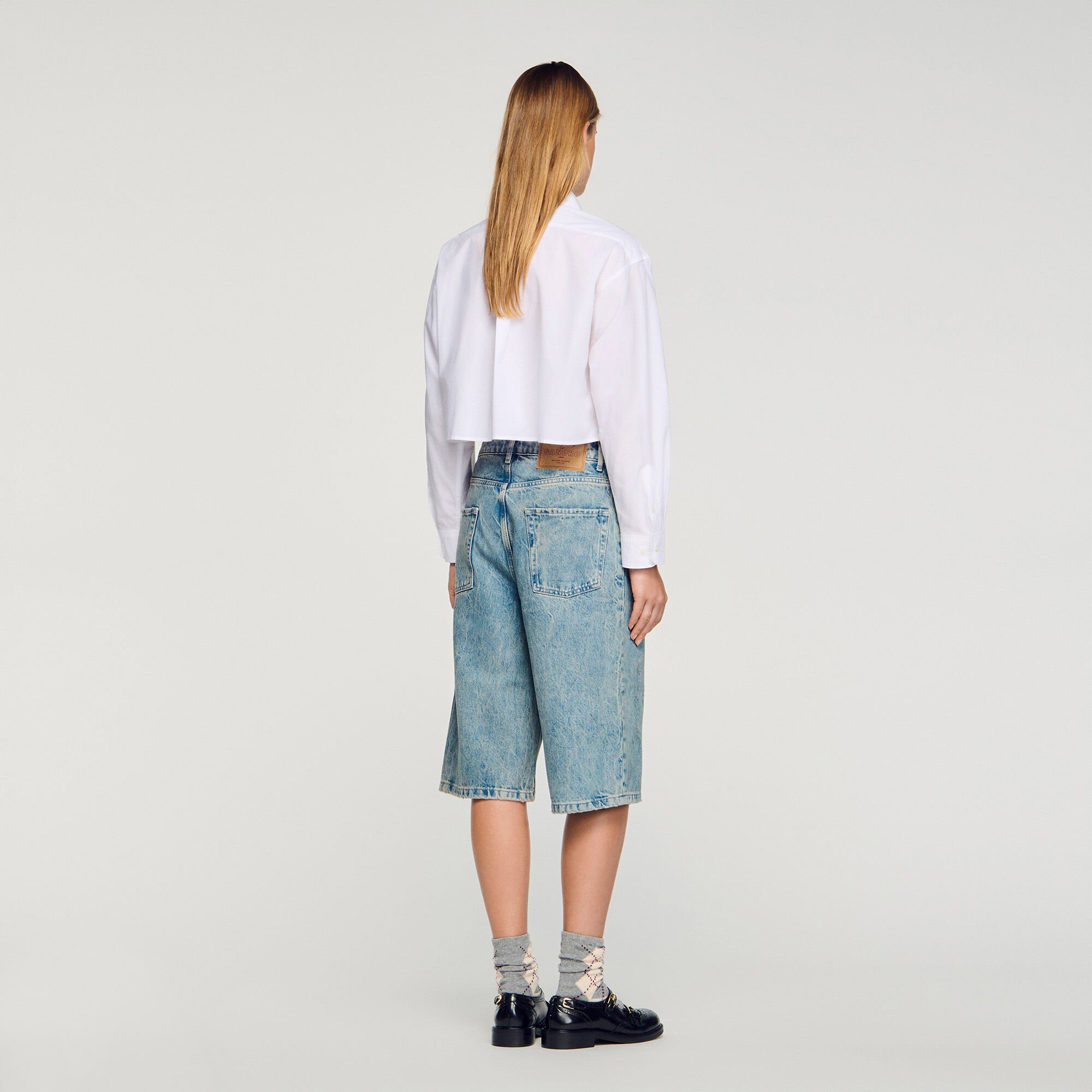 Distressed denim Bermuda shorts