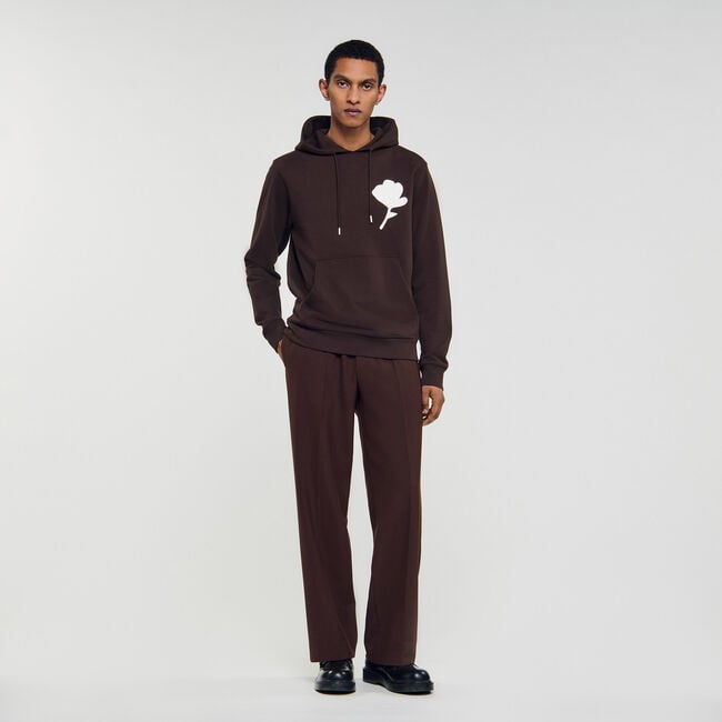 Sweatshirt with flower patch
