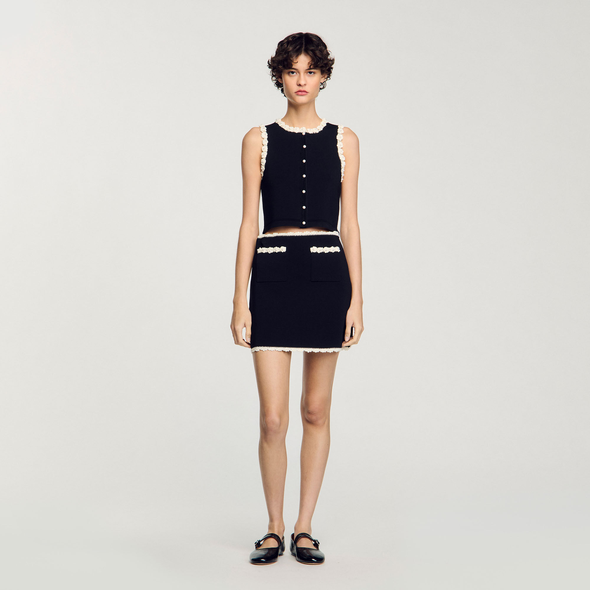 Short skirt with crochet details
