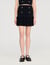 Short pleated knit skirt