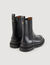 Ankle boots with notched sole