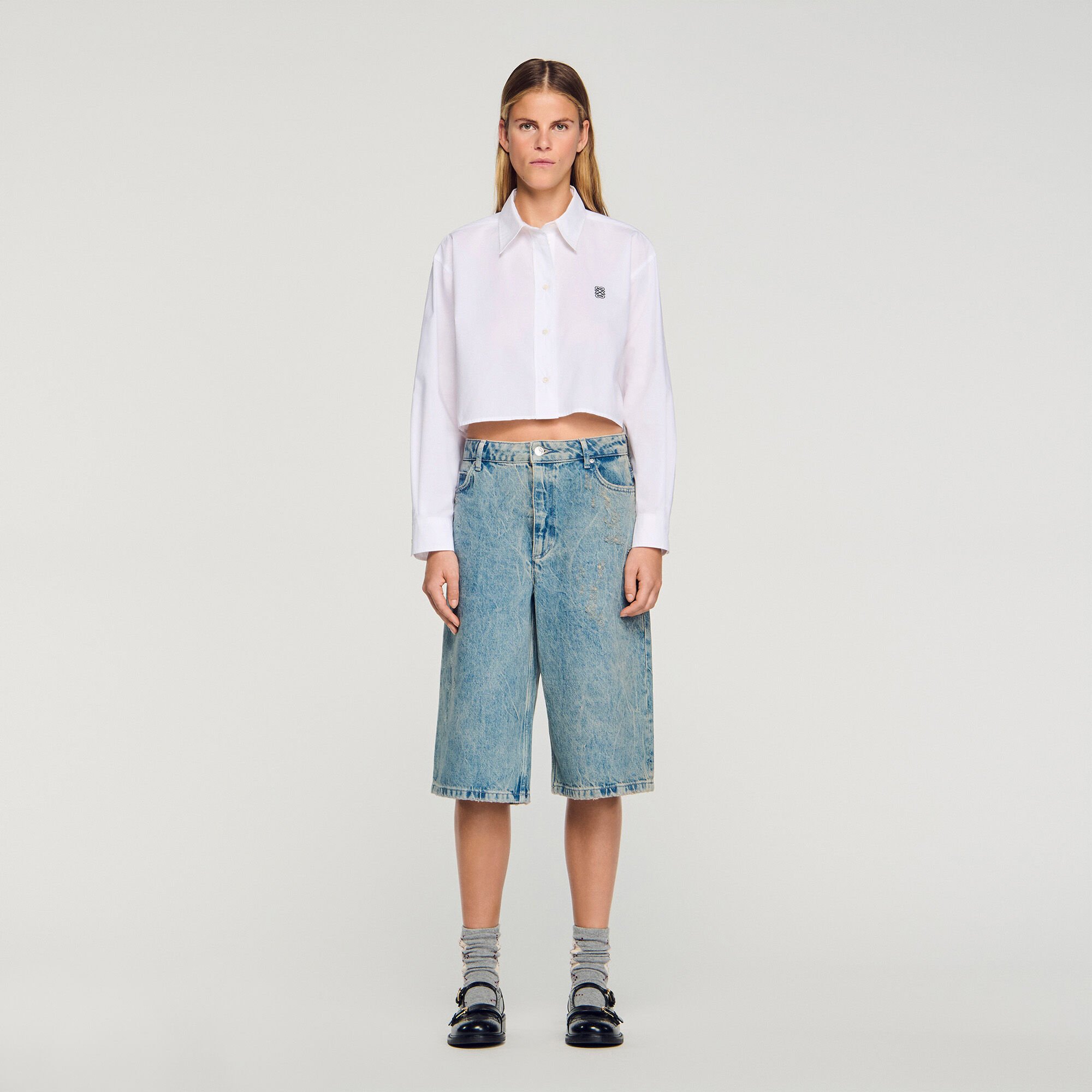 Distressed denim Bermuda shorts