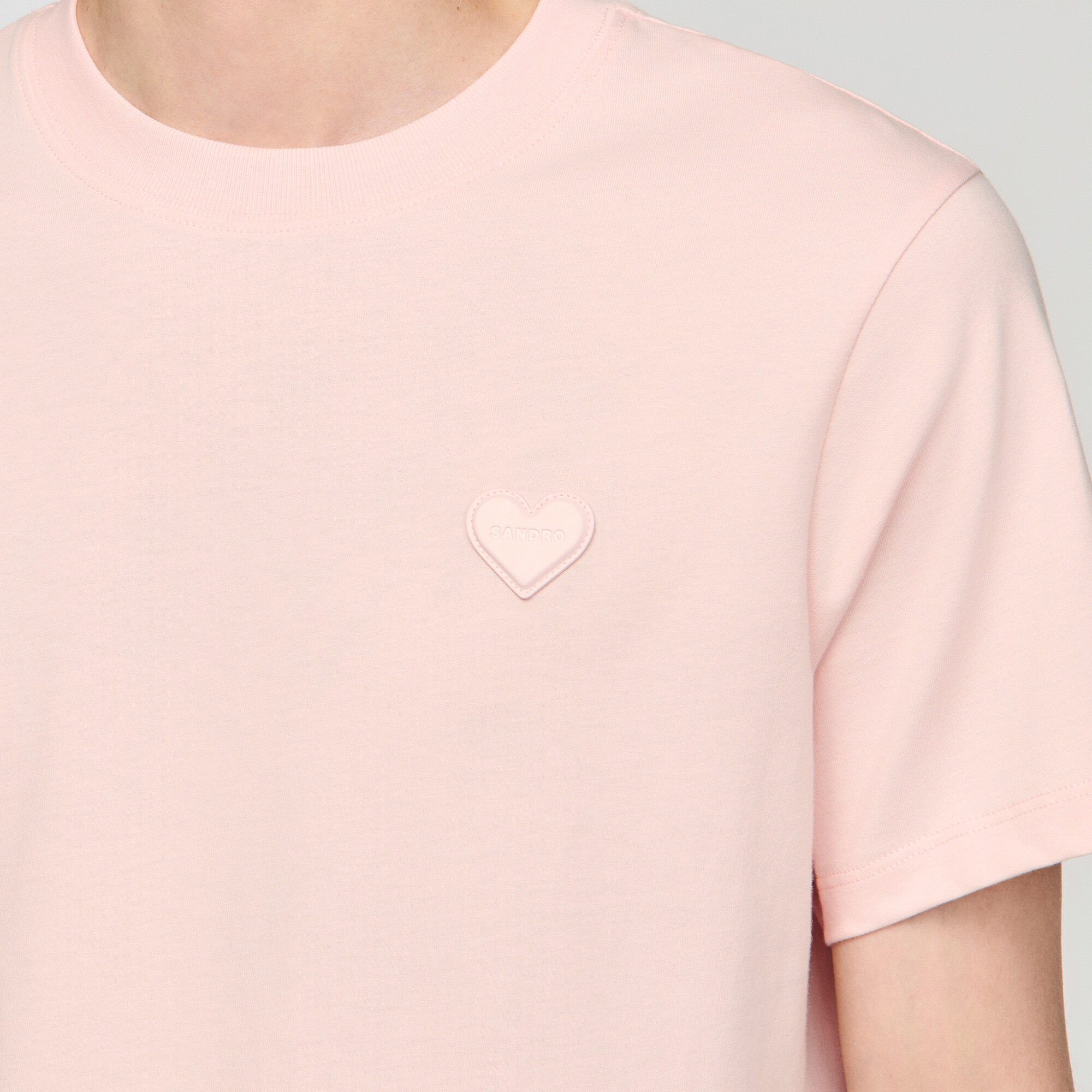 T-shirt with heart patch
