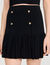 Short pleated knit skirt