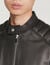 Leather jacket with quilted trims