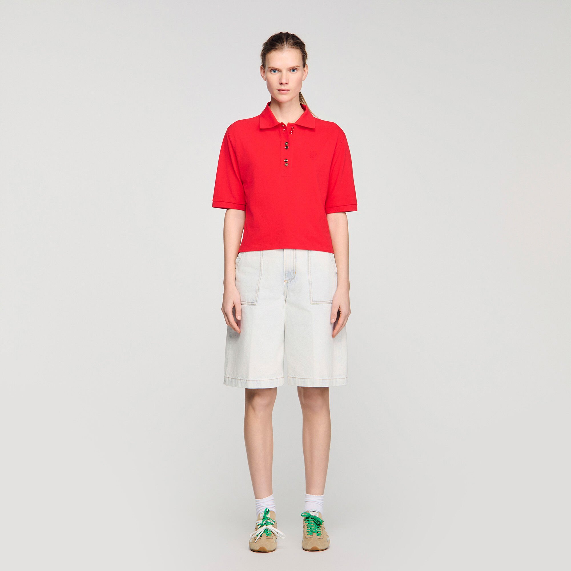 Polo shirt with decorative buttons