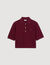 Polo shirt with decorative buttons