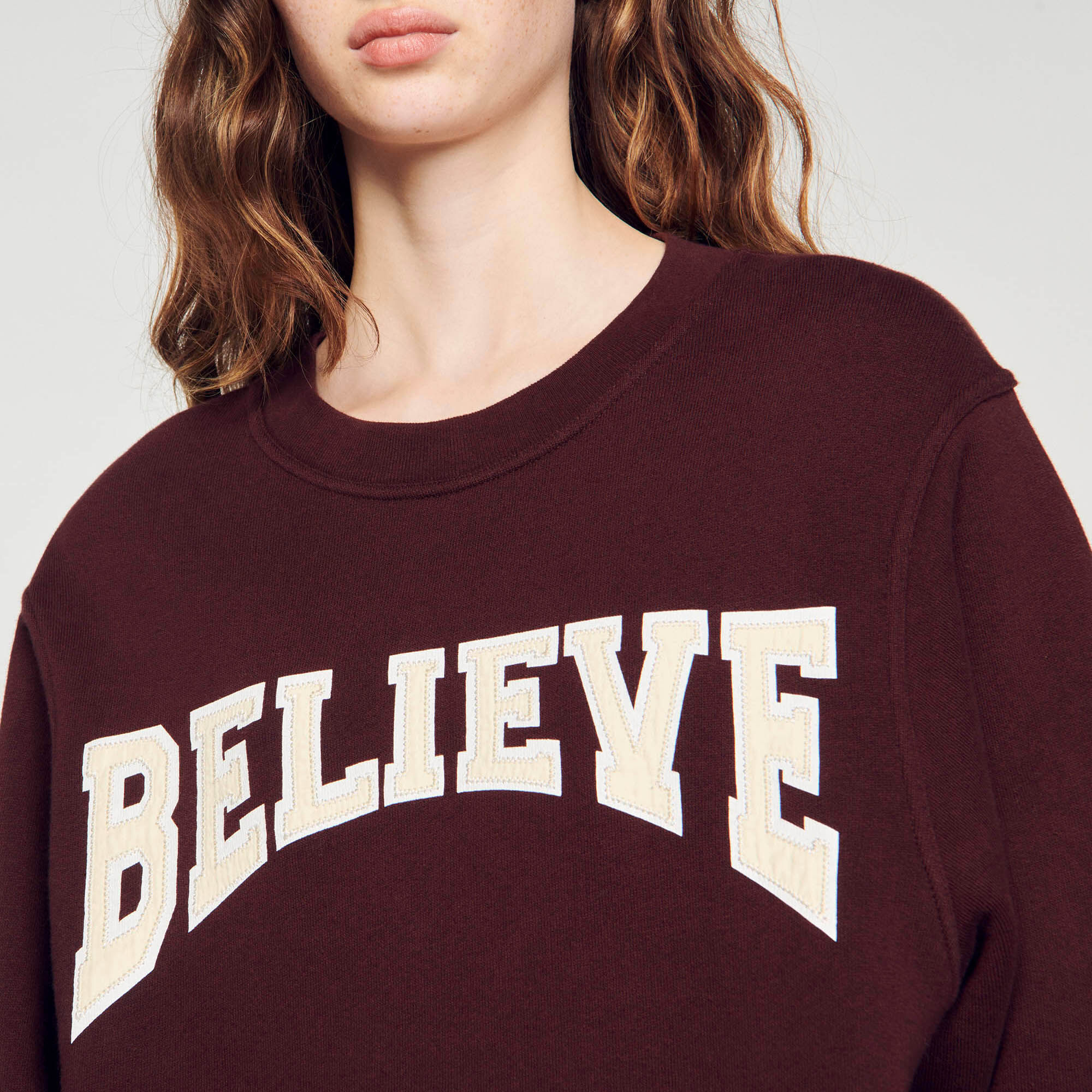 Believe sweatshirt top